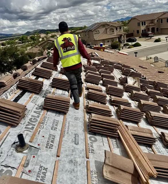Tile re-roof underway